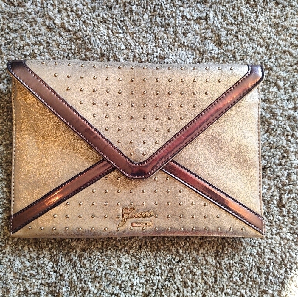 Guess Tan Clutch Purse with animal print on the inside!!
